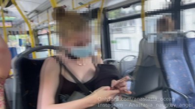 Topless Tease on Public Bus: Eye-Popping Ride!