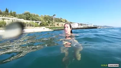 Nude Model's Wild Swim: Bare-All Adventure on Russia's Public Beach