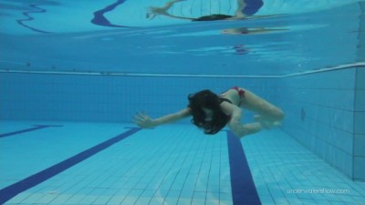 Red Swimsuit Babe with a Wild Bush Getting Wet Underwater